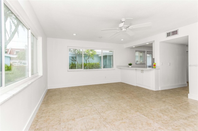 241 Skiff Pt Unit 1, Clearwater Beach, FL 33767 - spare room with ceiling fan, recessed lighting, baseboards, and light tile patterned floors