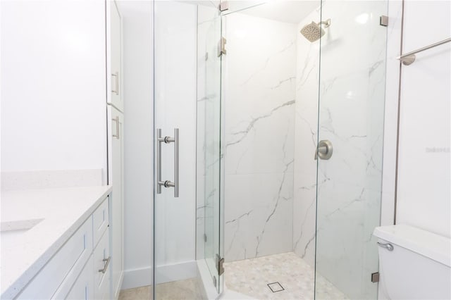 241 Skiff Pt Unit 1, Clearwater Beach, FL 33767 - full bathroom with a marble finish shower, vanity, and toilet