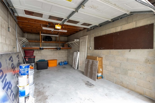 241 Skiff Pt Unit 1, Clearwater Beach, FL 33767 - garage featuring concrete block wall