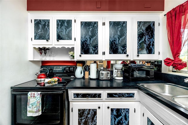 614 12th St NW, Largo, FL 33770 - bar area with black appliances and a sink