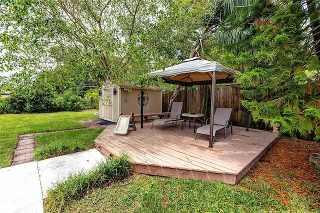 614 12th St NW, Largo, FL 33770 - wooden terrace featuring a shed