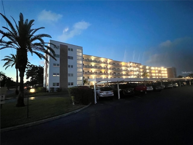 5501 80th St N Unit 206, Saint Petersburg, FL 33709 - view of building exterior featuring covered parking