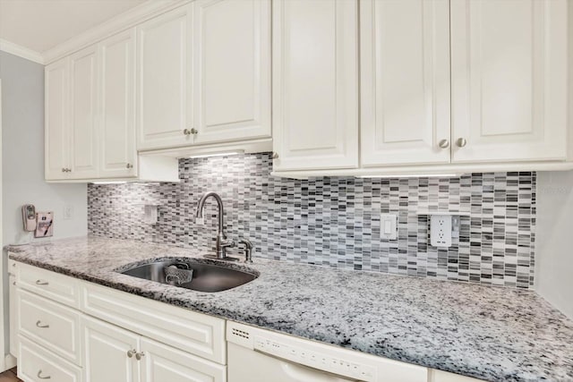5501 80th St N Unit 206, Saint Petersburg, FL 33709 - kitchen featuring backsplash, light stone counters, white cabinets, and dishwasher