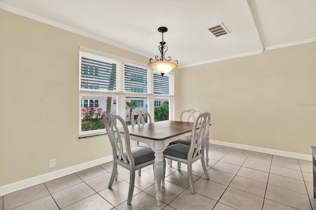 5501 80th St N Unit 206, Saint Petersburg, FL 33709 - dining area with crown molding and light tile patterned floors