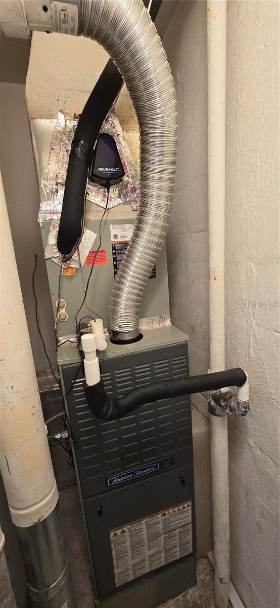 5501 80th St N Unit 206, Saint Petersburg, FL 33709 - detailed view of concrete block wall and heating unit