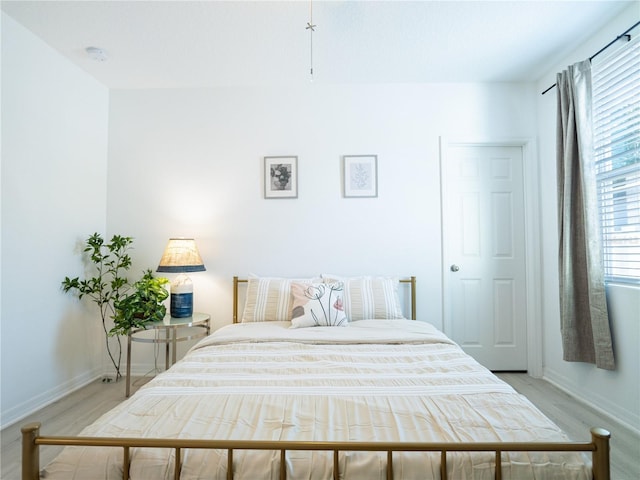 573 Vista Villages Blvd, Davenport, FL 33896 - bedroom with light wood finished floors and baseboards