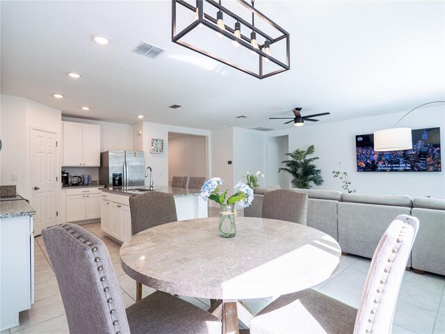 573 Vista Villages Blvd, Davenport, FL 33896 - dining area with recessed lighting, light tile patterned floors, and ceiling fan