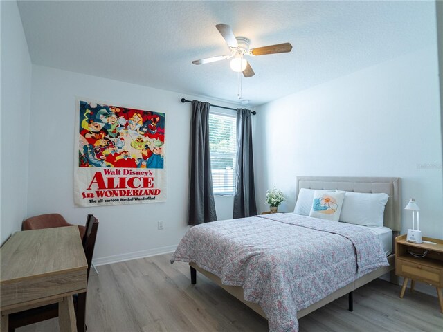 573 Vista Villages Blvd, Davenport, FL 33896 - bedroom featuring light wood finished floors and a ceiling fan