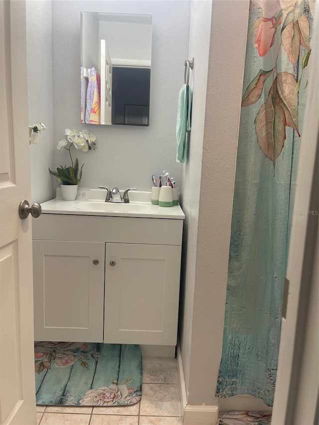 3802 Cortez Cir Unit D, Tampa, FL 33614 - full bathroom with vanity, tile patterned flooring, and curtained shower