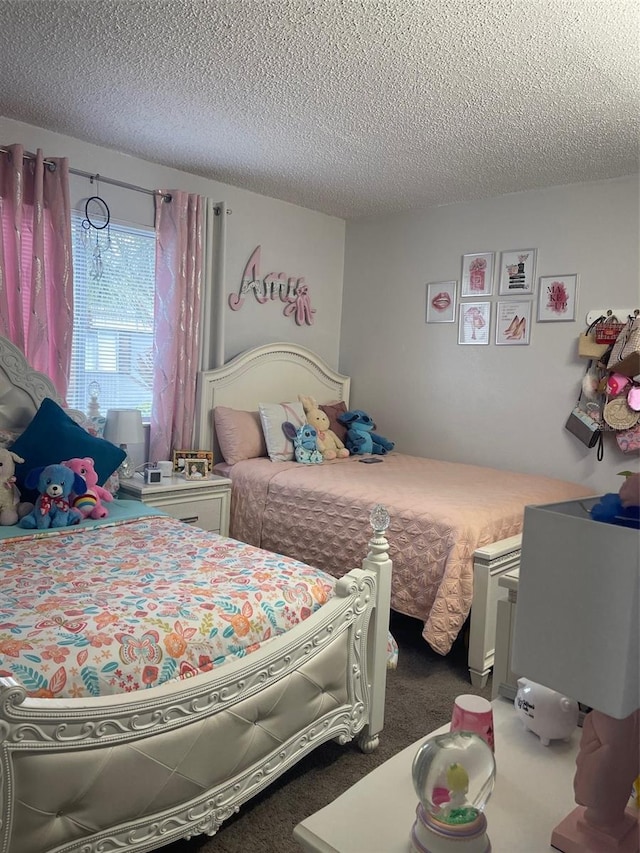 3802 Cortez Cir Unit D, Tampa, FL 33614 - bedroom featuring carpet floors and a textured ceiling