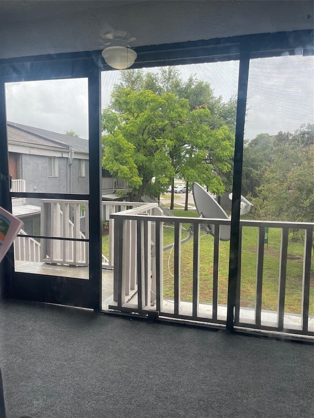 3802 Cortez Cir Unit D, Tampa, FL 33614 - balcony featuring a ceiling fan