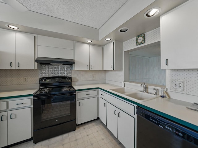 7600 Sun Island Dr S Unit 603, South Pasadena, FL 33707 - kitchen featuring black appliances, under cabinet range hood, light countertops, white cabinetry, and recessed lighting