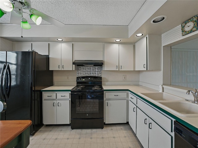 7600 Sun Island Dr S Unit 603, South Pasadena, FL 33707 - kitchen with black appliances, white cabinetry, light floors, light countertops, and recessed lighting