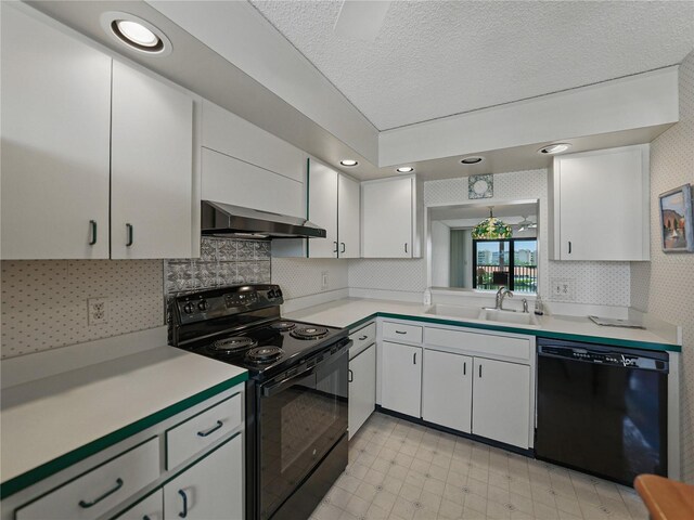 7600 Sun Island Dr S Unit 603, South Pasadena, FL 33707 - kitchen featuring black appliances, extractor fan, light countertops, decorative backsplash, and a textured ceiling