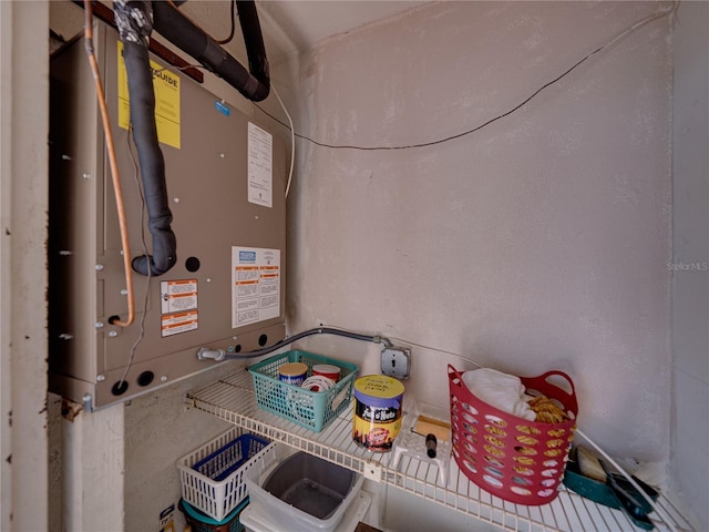 7600 Sun Island Dr S Unit 603, South Pasadena, FL 33707 - utility room featuring heating unit