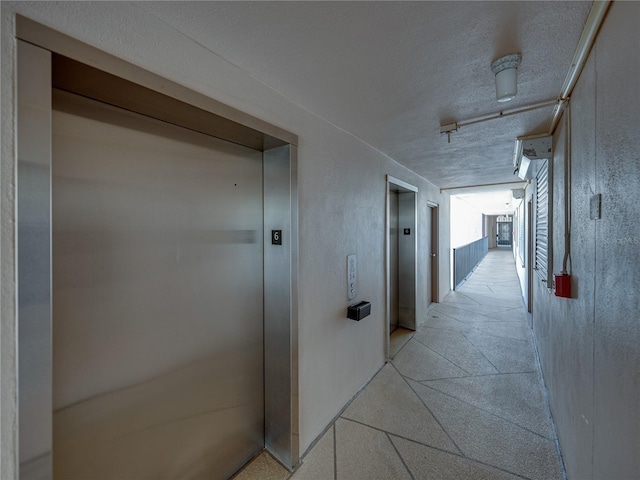 7600 Sun Island Dr S Unit 603, South Pasadena, FL 33707 - corridor featuring elevator
