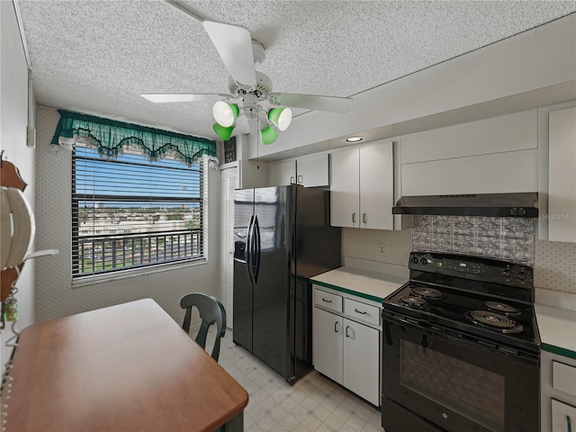 7600 Sun Island Dr S Unit 603, South Pasadena, FL 33707 - kitchen featuring black appliances, extractor fan, ceiling fan, light countertops, and a textured ceiling