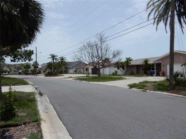 1897 Dolphin Blvd S, Saint Petersburg, FL 33707 - view of asphalt street featuring street lights and curbs