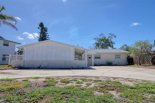 1897 Dolphin Blvd S, Saint Petersburg, FL 33707 - ranch-style house featuring brick siding and driveway