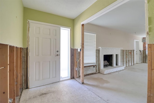 1897 Dolphin Blvd S, Saint Petersburg, FL 33707 - foyer with a brick fireplace