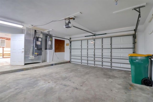 1897 Dolphin Blvd S, Saint Petersburg, FL 33707 - garage with heating unit and a garage door opener