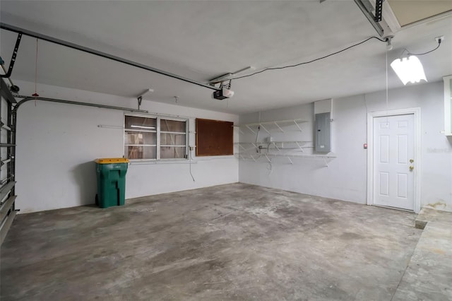 1897 Dolphin Blvd S, Saint Petersburg, FL 33707 - garage with electric panel and a garage door opener