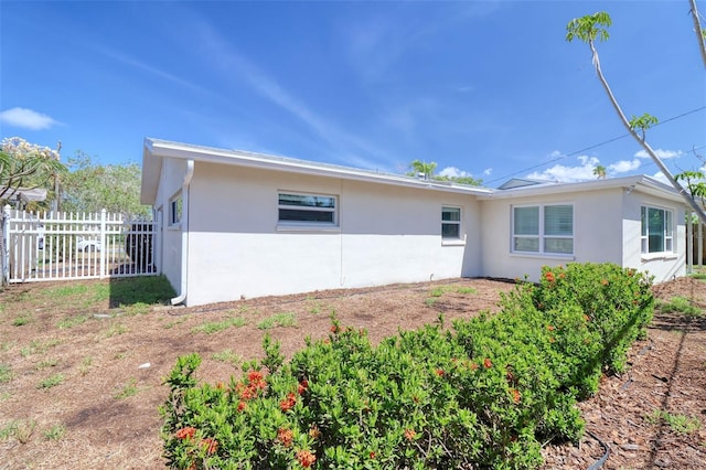 1897 Dolphin Blvd S, Saint Petersburg, FL 33707 - view of side of property with stucco siding