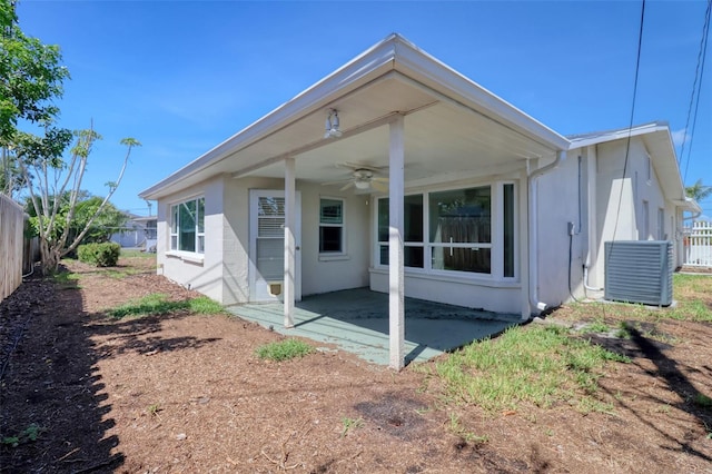 1897 Dolphin Blvd S, Saint Petersburg, FL 33707 - back of house with ceiling fan, a patio area, and stucco siding