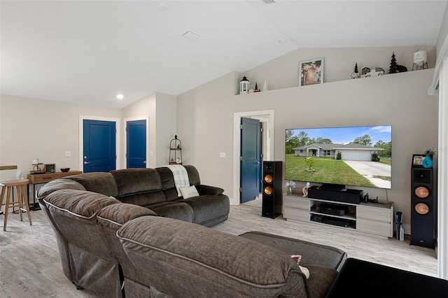 16473 Scaup Duck Ave, Weeki Wachee, FL 34614 - living area featuring vaulted ceiling and wood finished floors