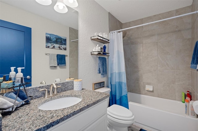 16473 Scaup Duck Ave, Weeki Wachee, FL 34614 - full bath featuring toilet, vanity, shower / bath combination with curtain, and a textured wall