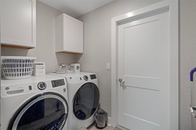 16473 Scaup Duck Ave, Weeki Wachee, FL 34614 - washroom with washing machine and clothes dryer, cabinet space, and a textured wall