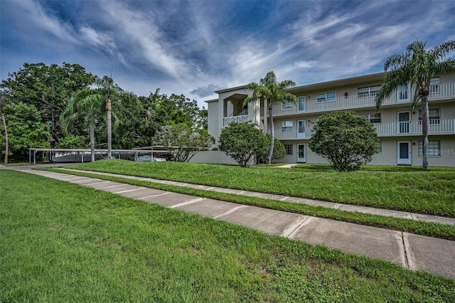 960 Virginia St Unit 202, Dunedin, FL 34698 - view of home's community with a lawn