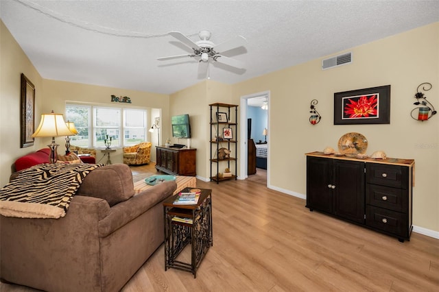 960 Virginia St Unit 202, Dunedin, FL 34698 - living room featuring light wood-style floors and a ceiling fan