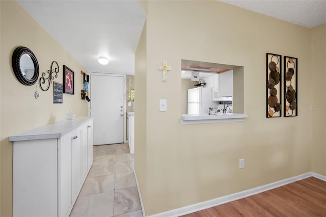 960 Virginia St Unit 202, Dunedin, FL 34698 - corridor with baseboards