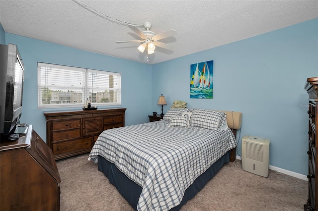 960 Virginia St Unit 202, Dunedin, FL 34698 - bedroom with carpet floors, a textured ceiling, and a ceiling fan