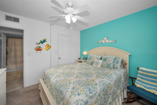 960 Virginia St Unit 202, Dunedin, FL 34698 - bedroom featuring a textured ceiling, ceiling fan, and carpet flooring