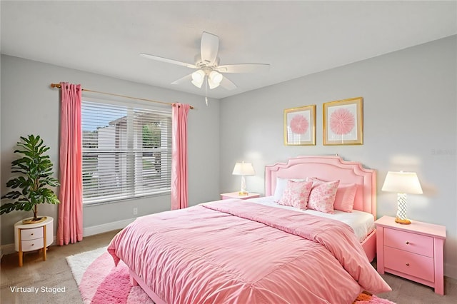 3121 Egret Ter, Safety Harbor, FL 34695 - bedroom with carpet floors, baseboards, and a ceiling fan
