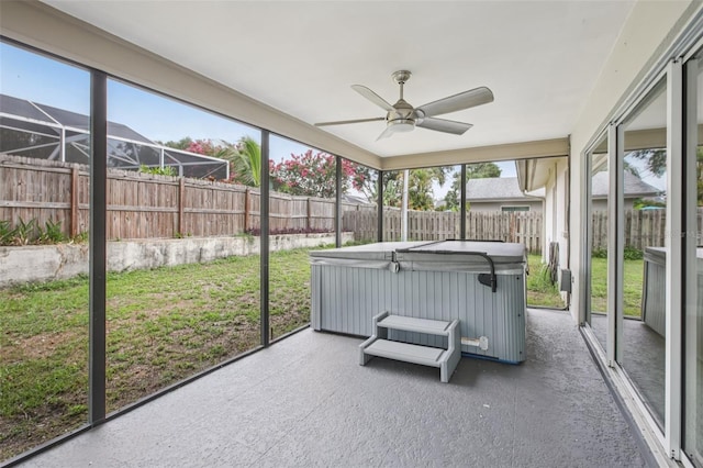 3121 Egret Ter, Safety Harbor, FL 34695 - unfurnished sunroom featuring a hot tub and a ceiling fan