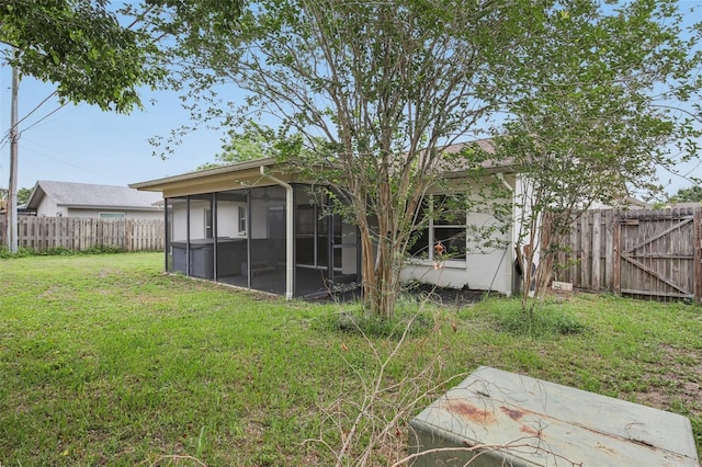 3121 Egret Ter, Safety Harbor, FL 34695 - rear view of house with a sunroom
