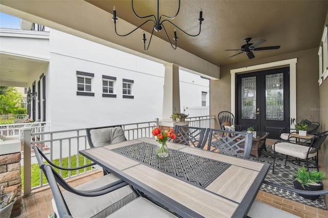 10422 Fenceline Rd, New Port Richey, FL 34655 - view of patio featuring french doors, outdoor dining area, and ceiling fan