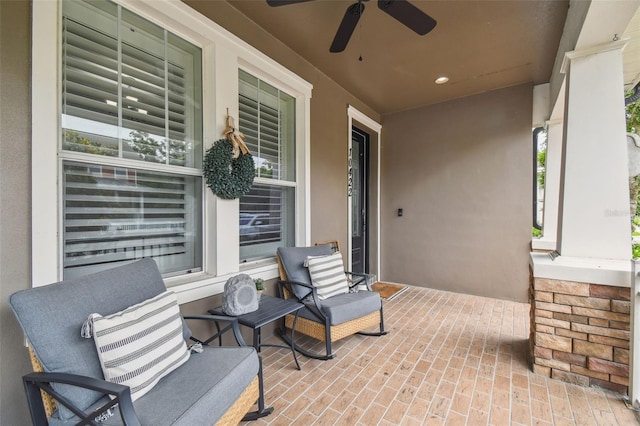 10422 Fenceline Rd, New Port Richey, FL 34655 - porch featuring ceiling fan