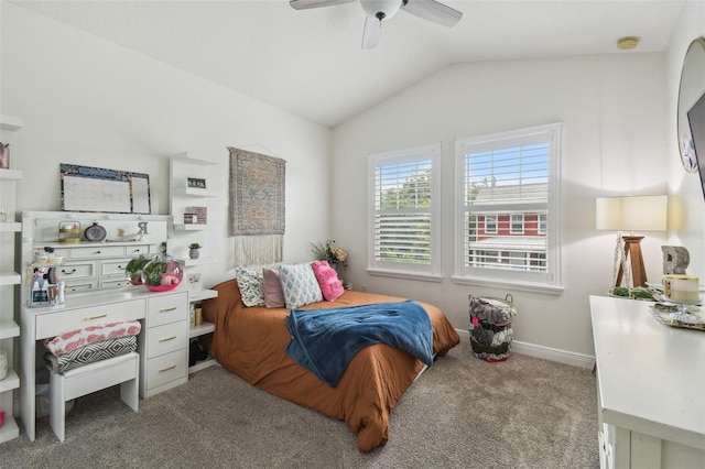 10422 Fenceline Rd, New Port Richey, FL 34655 - carpeted bedroom with vaulted ceiling, ceiling fan, and baseboards