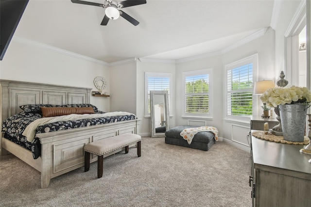 10422 Fenceline Rd, New Port Richey, FL 34655 - bedroom with light colored carpet, crown molding, ceiling fan, baseboards, and vaulted ceiling