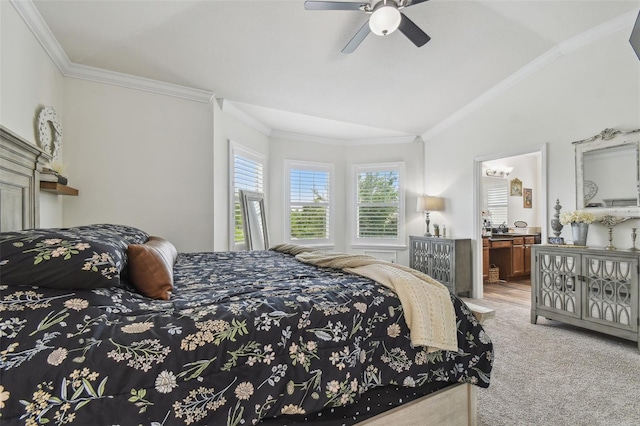 10422 Fenceline Rd, New Port Richey, FL 34655 - carpeted bedroom featuring vaulted ceiling, crown molding, a ceiling fan, and ensuite bath