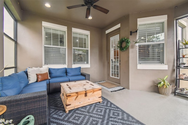 10422 Fenceline Rd, New Port Richey, FL 34655 - sunroom featuring an outdoor living space and a ceiling fan