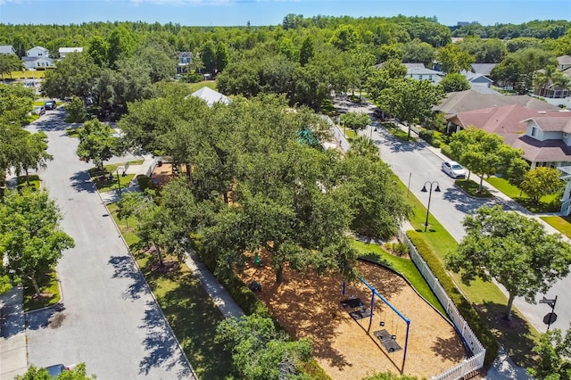 10422 Fenceline Rd, New Port Richey, FL 34655 - aerial perspective of suburban area with a forest