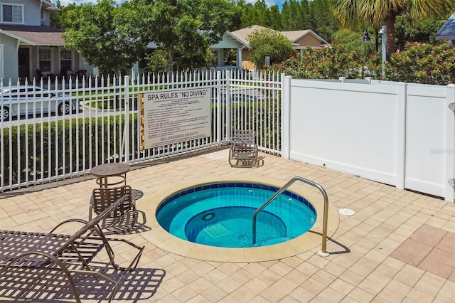 10422 Fenceline Rd, New Port Richey, FL 34655 - view of pool with a hot tub