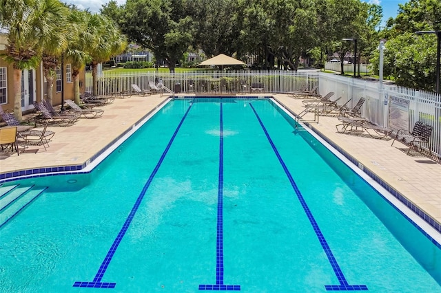 10422 Fenceline Rd, New Port Richey, FL 34655 - community pool with a patio