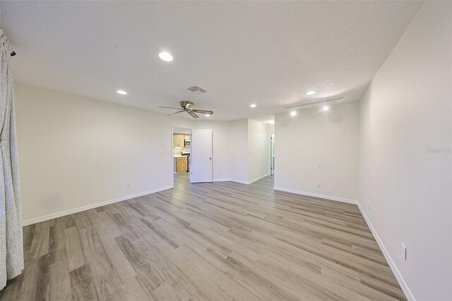 1508 Ingram Dr Unit 20, Sun City Center, FL 33573 - unfurnished room featuring recessed lighting, light wood-style floors, baseboards, and a ceiling fan
