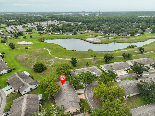1508 Ingram Dr Unit 20, Sun City Center, FL 33573 - aerial perspective of suburban area with a nearby body of water and a golf club